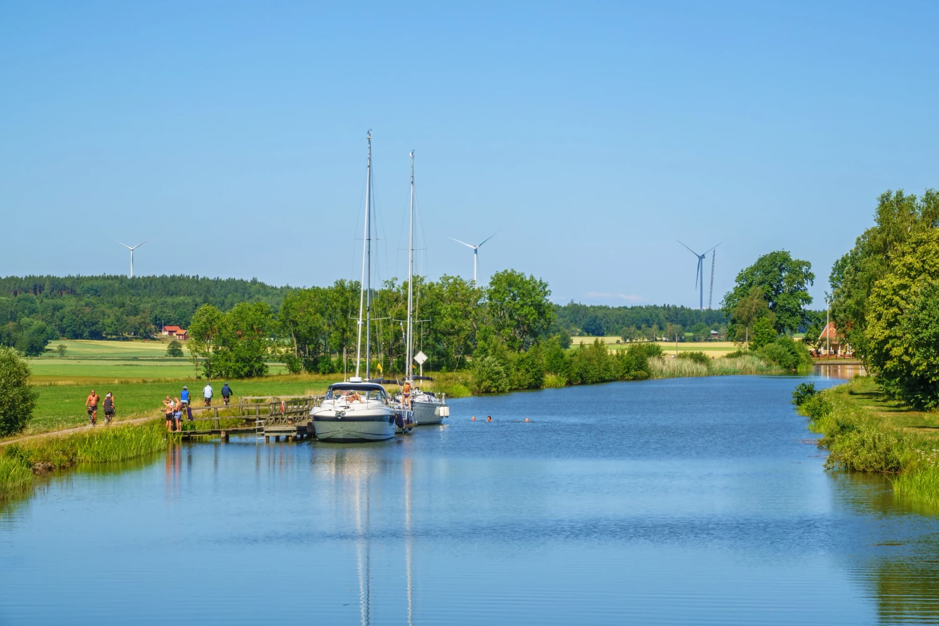 Boats at a jetty in the canal a beautiful summer day