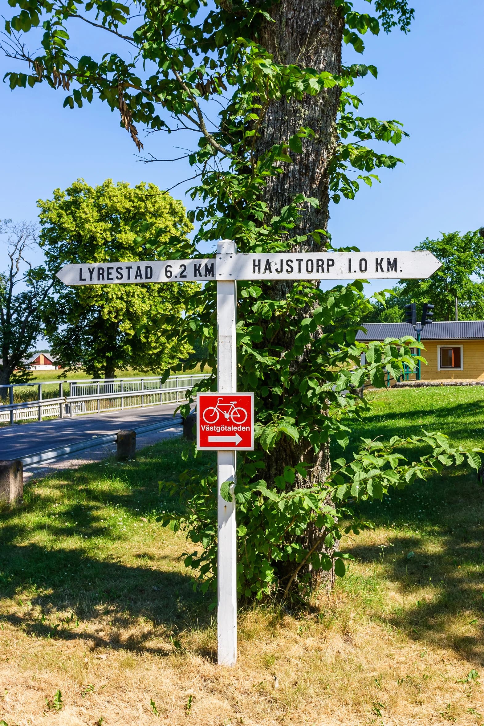 Directions on a cycle path by a canal