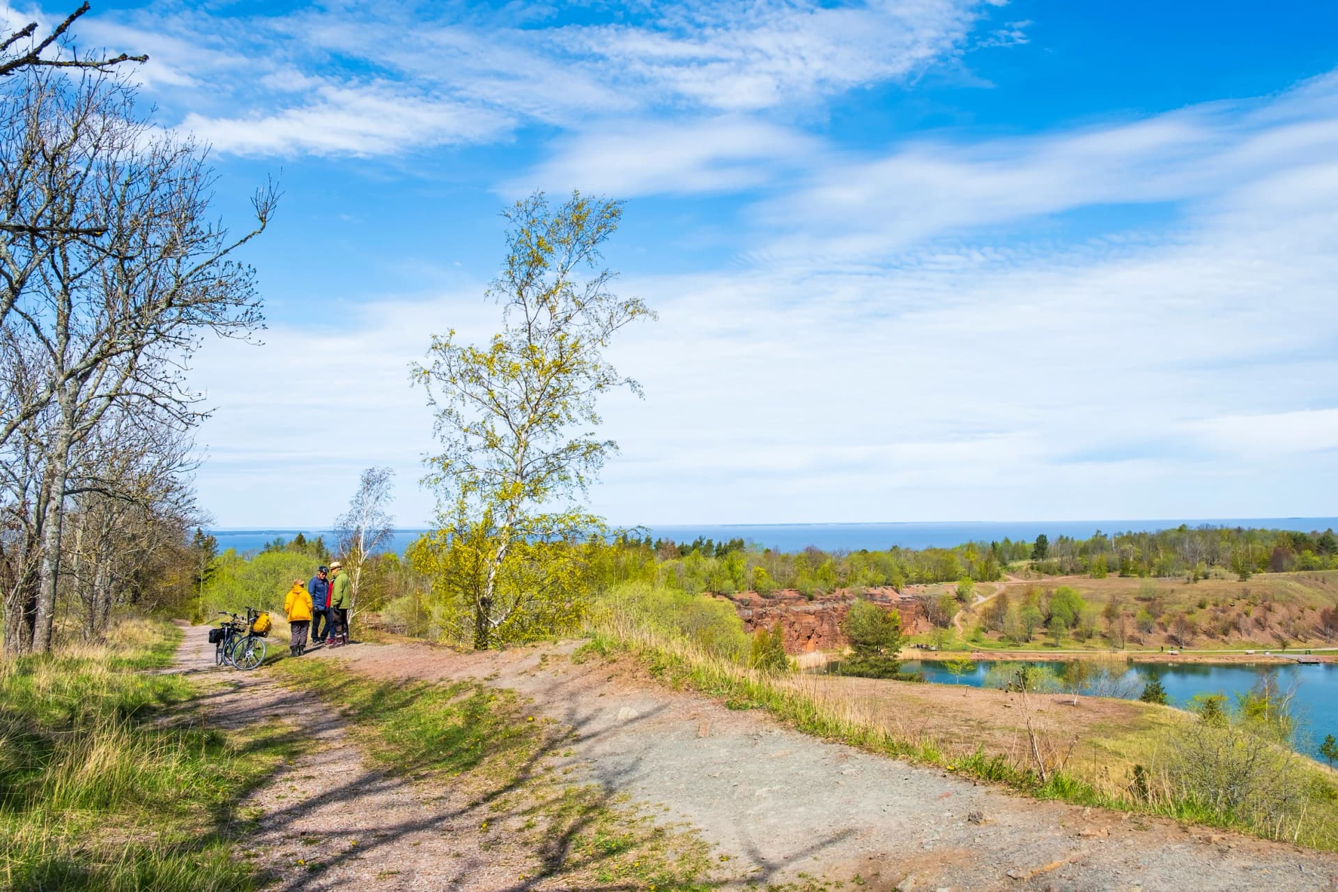 Cyclists on a path with beautiful views