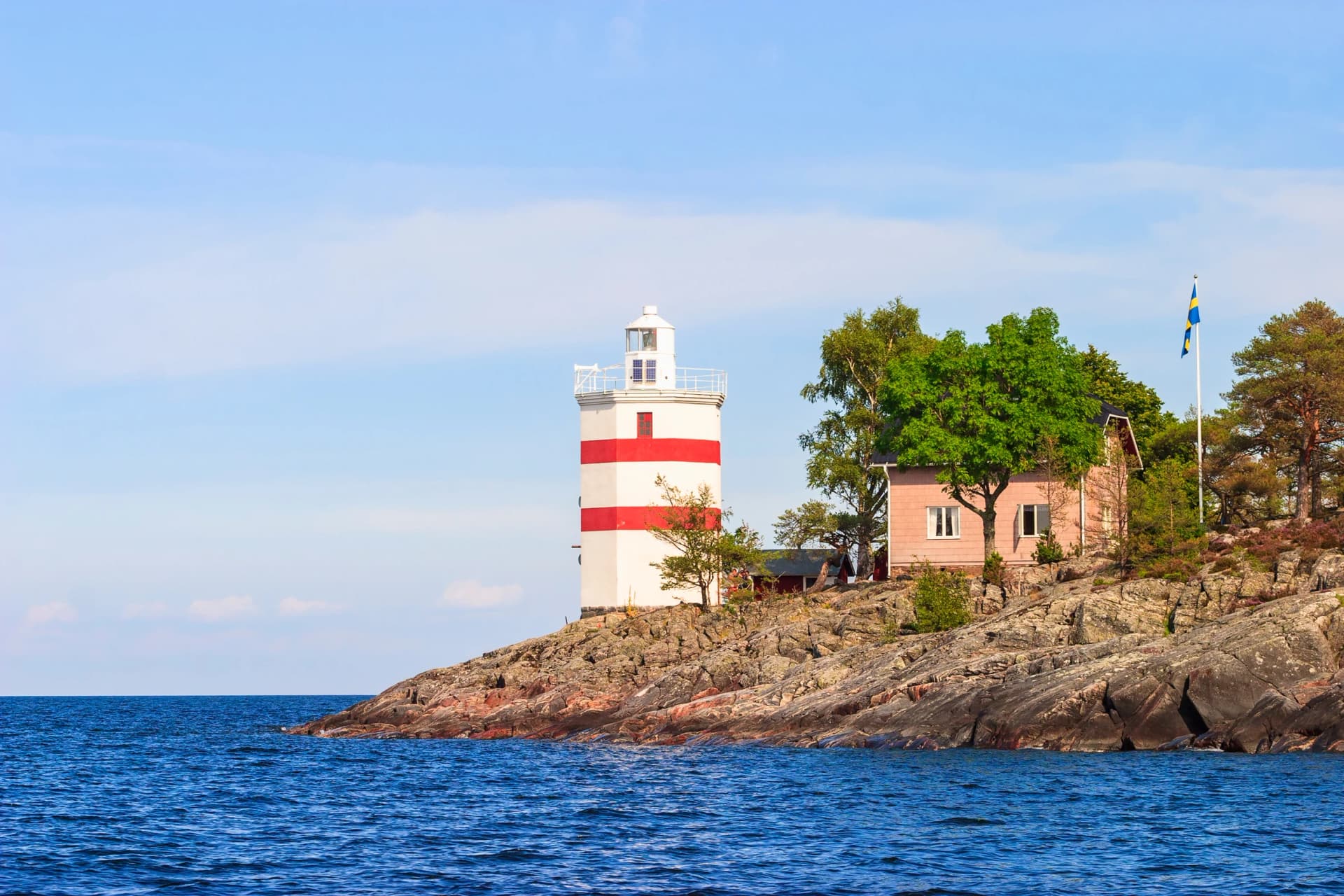 Lighthouse on the rocky island of Djurö national park in Lake Vänern