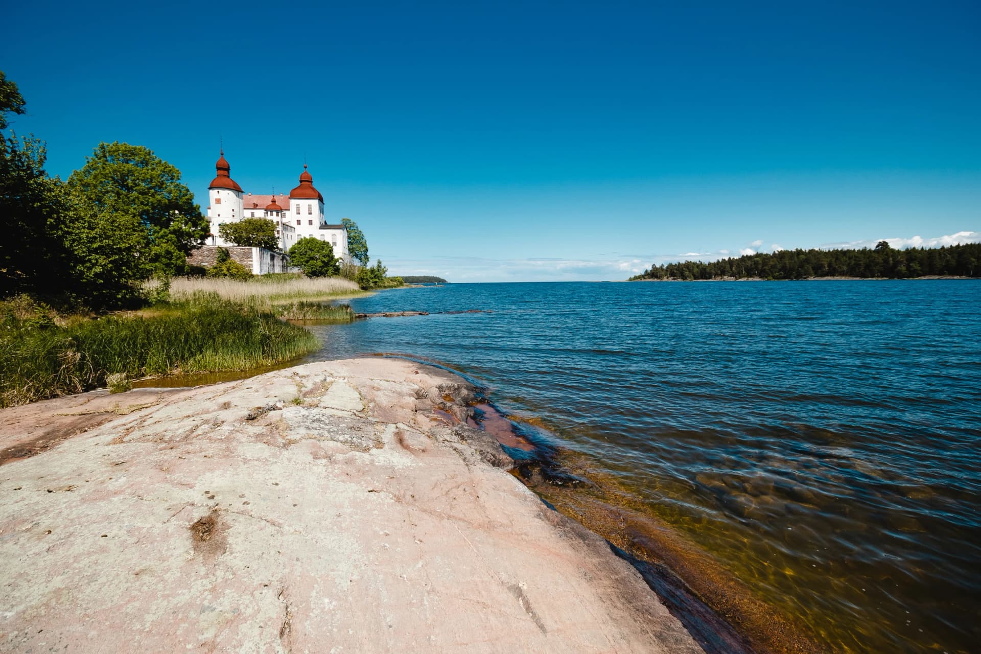 Läckö Castle by Lidköping seen from the beach on Lake Vänern