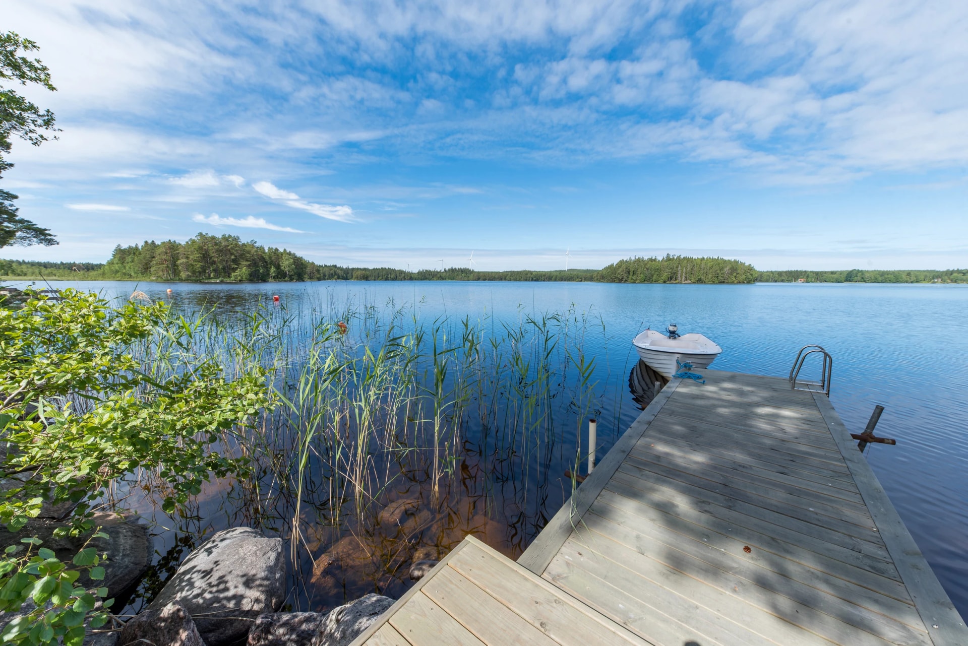 overlooking a boat jetty and a lake