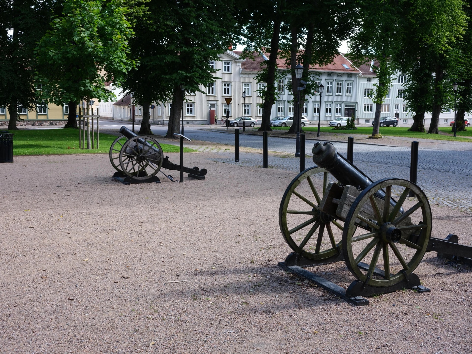 Two ancient canons standing in a park in Vänersborg, Sweden. They are fire canons used to alert if a fire broke out in the city.